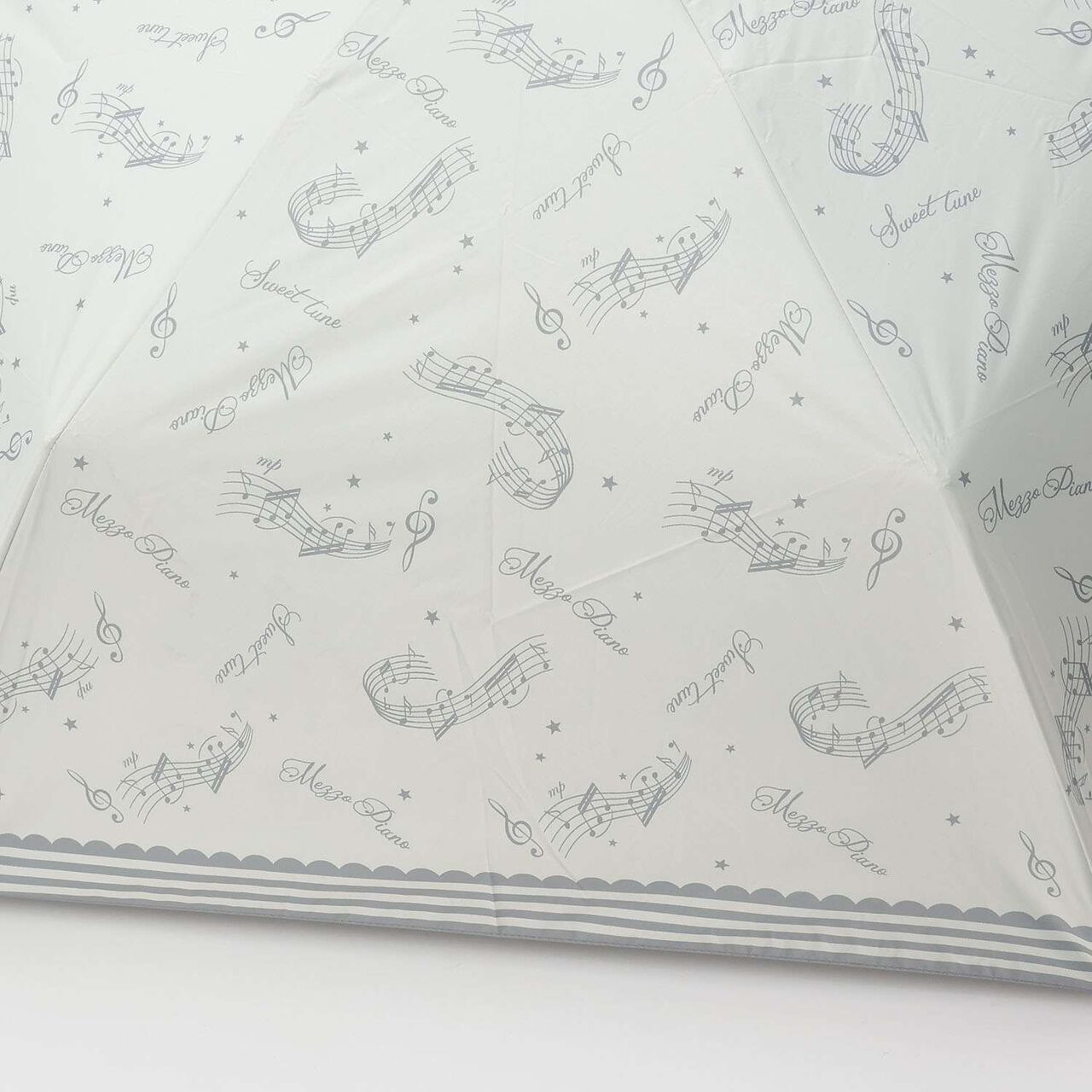 [UV 100%] [Heat Shielding] [Light Blocking] [All-Weather] With a Melody♪ Pattern Folding Umbrella,Ivory, large image number 3