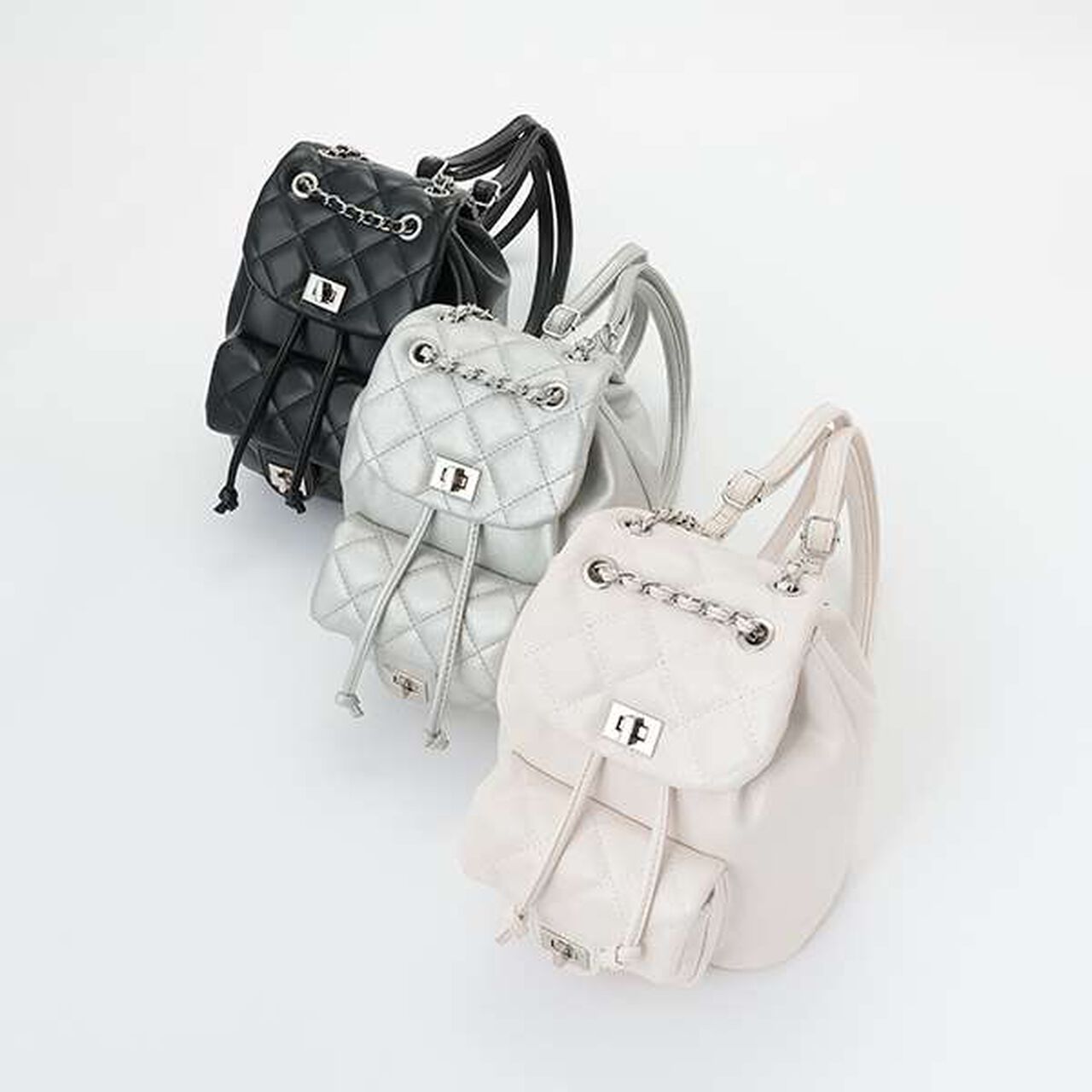chain mini backpack Micro Key Honeycreeper Wear it as a backpack with padded nylon straps or switch to the detachable chain strap for a purse that moves through the day your way Prada Nylon Mini Chain Backpack